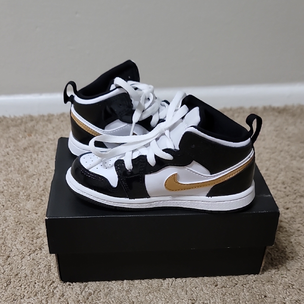 Jordan Black and Gold Sneakers Iconic Design